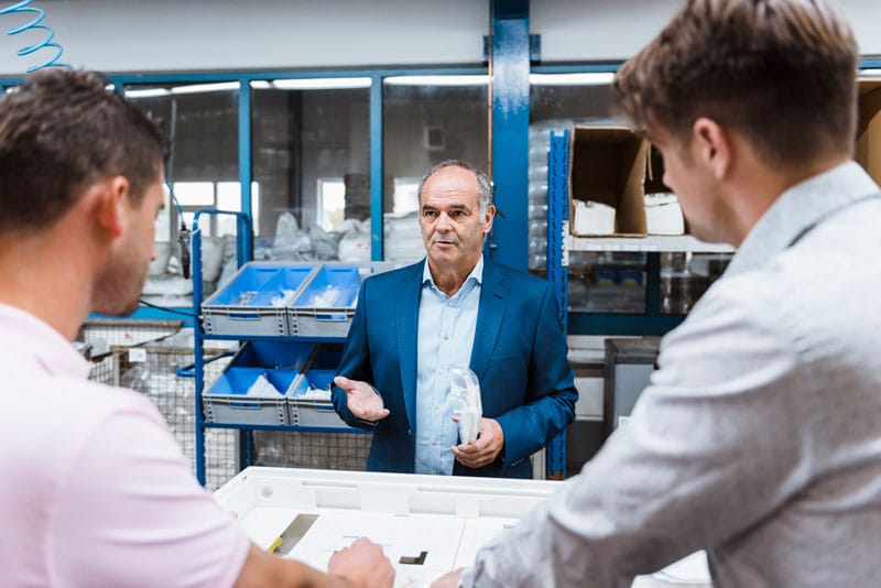 Salesperson promoting products from Equipment & Technology Buying Guide | ESI Show