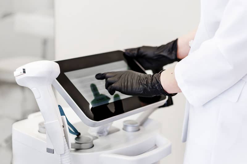 Technician using product from Equipment & Technology Buying Guide | ESI Show
